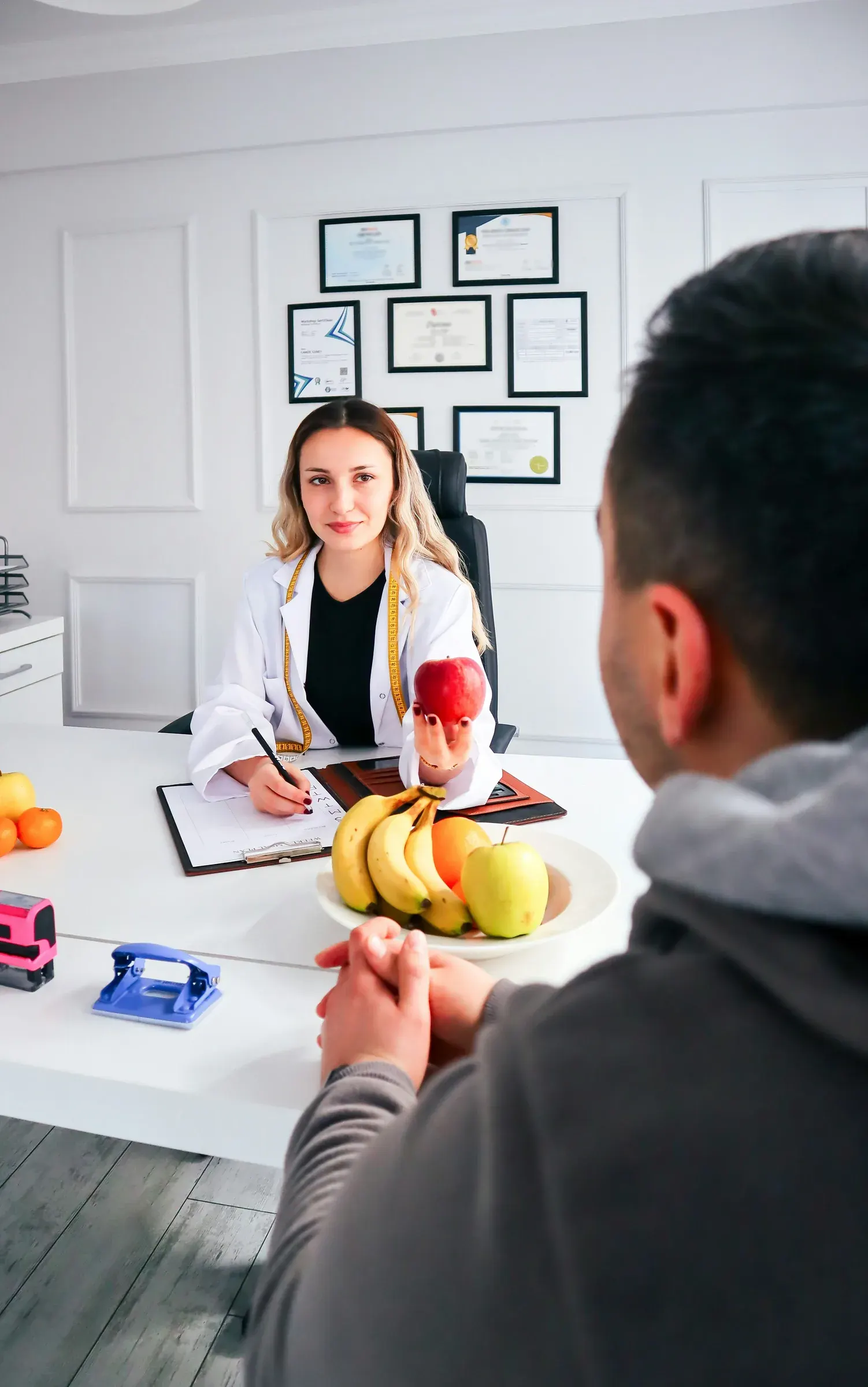 A clinician discussing long-term health and lifestyle factors